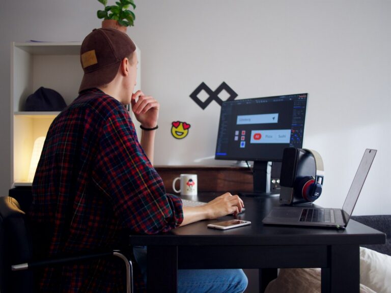 Freelancer working in a modern laptop workspace