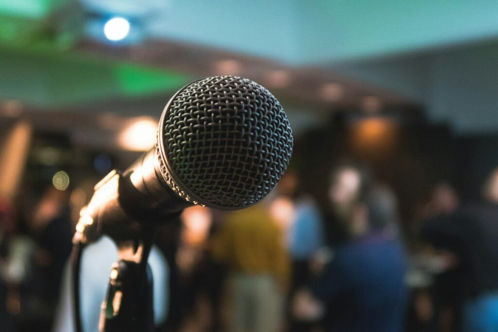 Presenter speaking to an audience in a meeting room